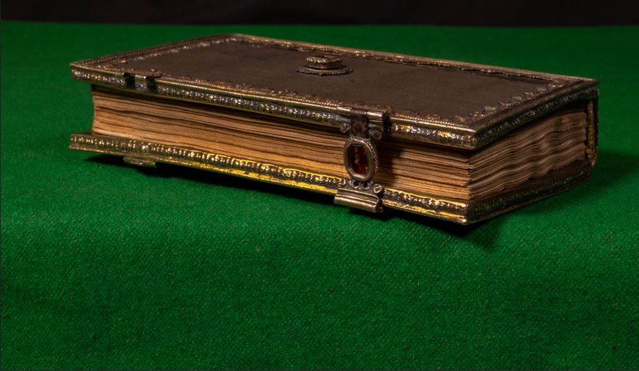 Closeup photograph of the Book of Hours held in the Wren Library.